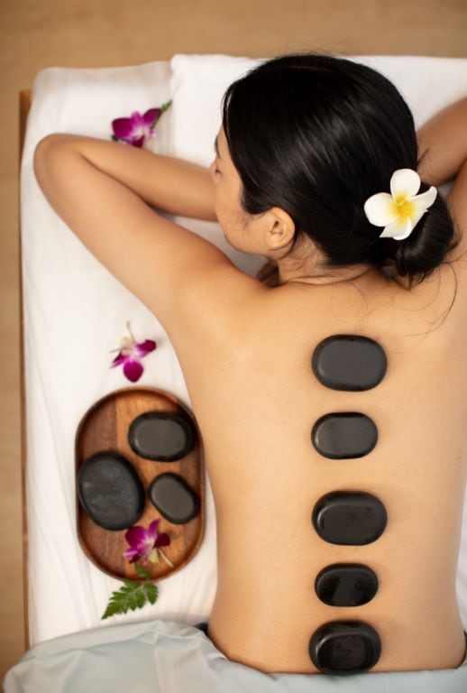 Read more about the article Discover the Magic of Hot Stone Massage!