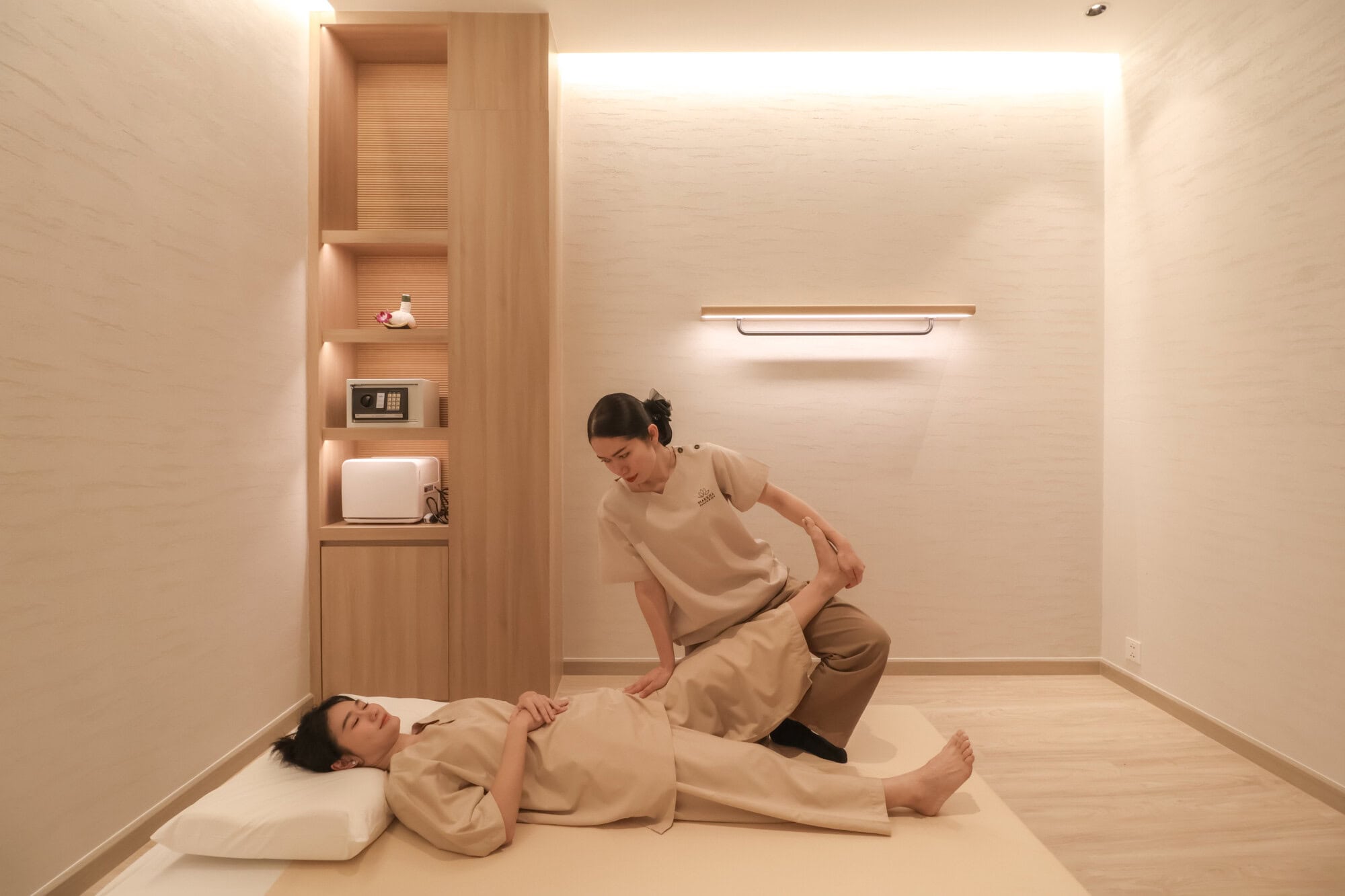 A woman having a Thai massage