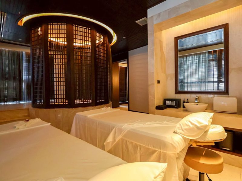 Luxurious spa treatment room at Makkha Spa in Chiang Mai featuring therapeutic massage beds, elegant decor, and a relaxing ambiance designed for ultimate relaxation and wellness.